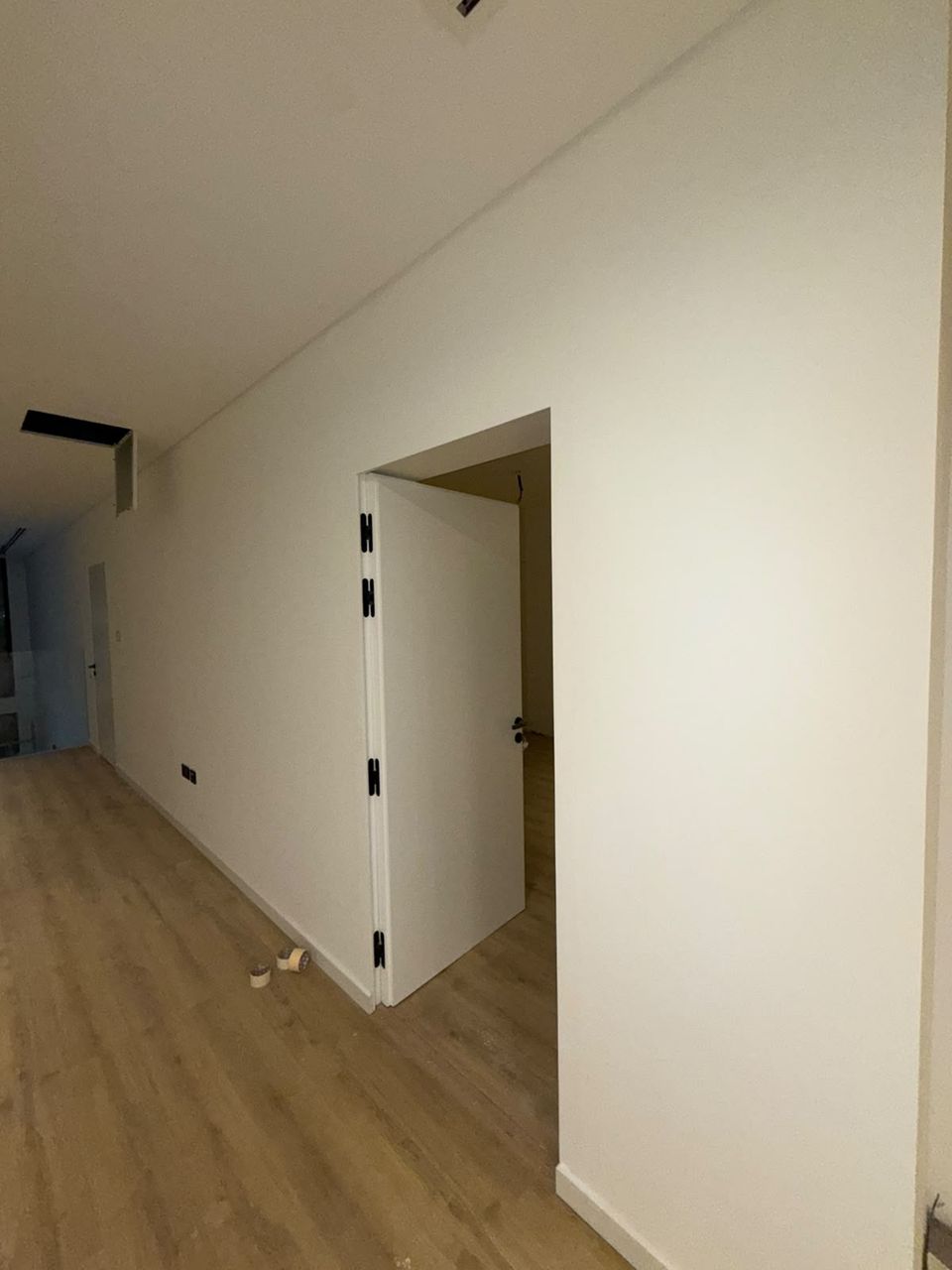 Hidden door with black lever, Meydan District One villa