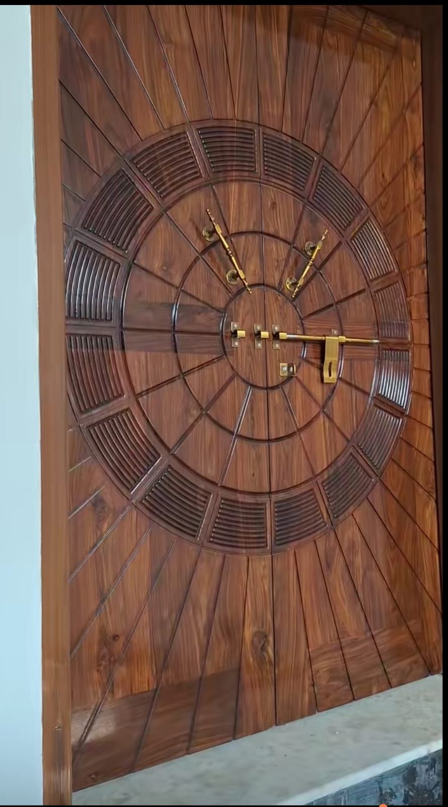 Carved Wooden Main Door With Radial Pattern