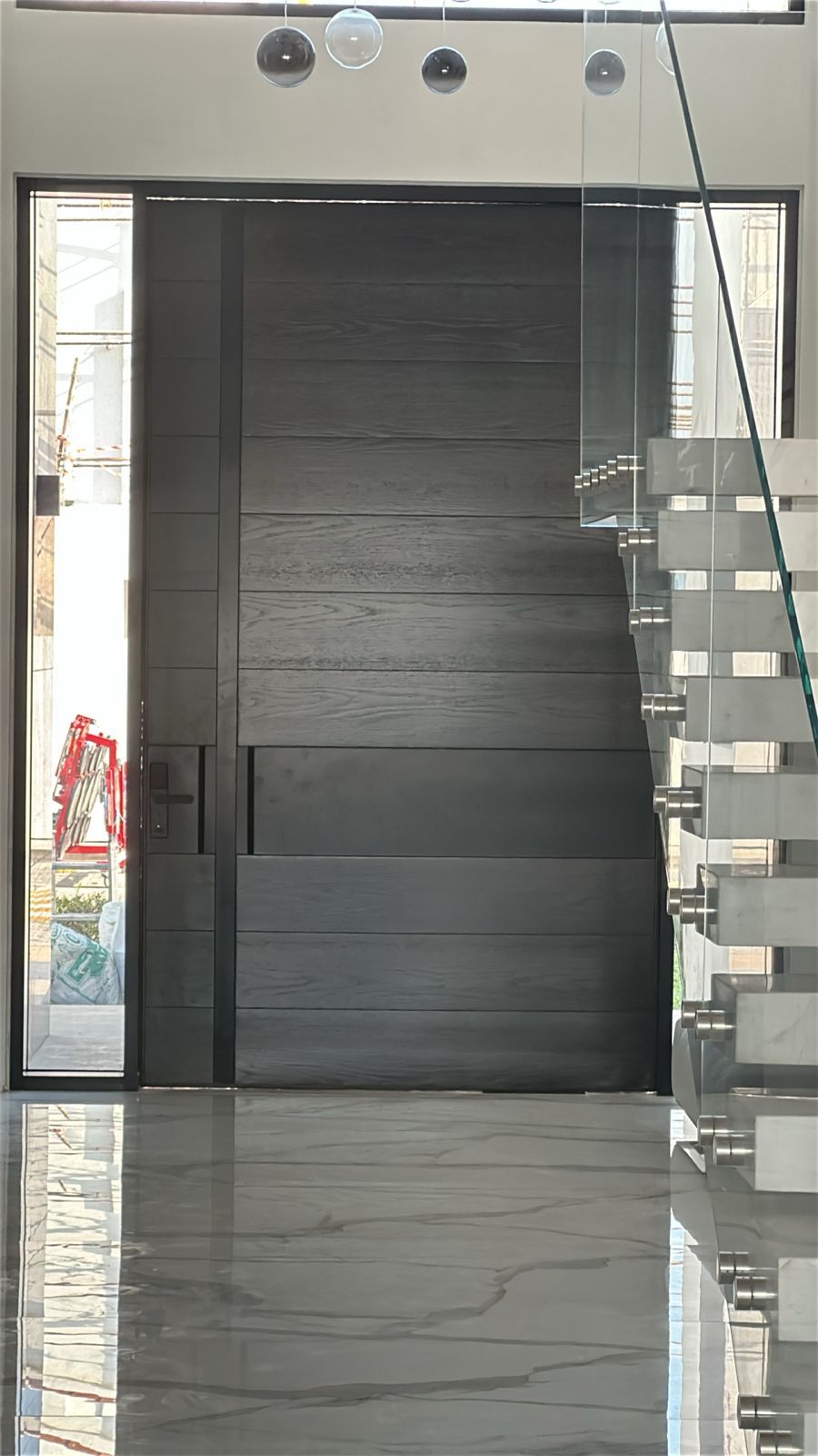 Dark Grooved Pivot Main Door