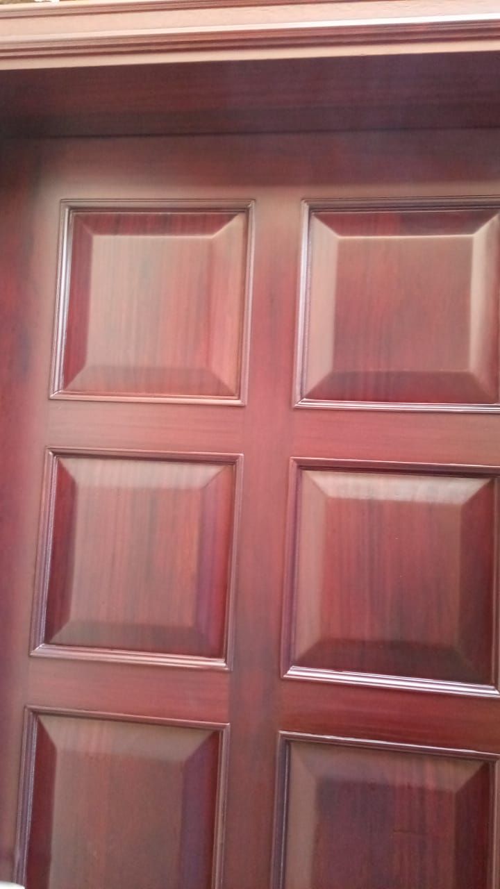 Glossy Mahogany Raised Panels Close Up
