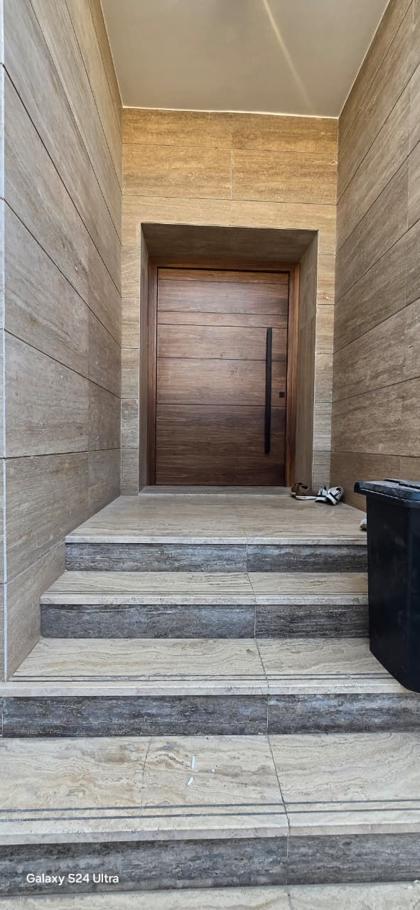 Travertine entrance corridor to the pivot door, Jumeirah