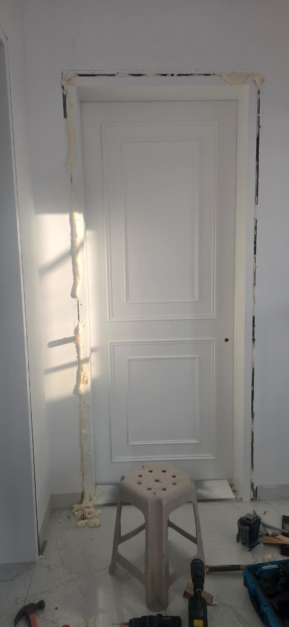 White moulded interior door in a Springs villa hallway