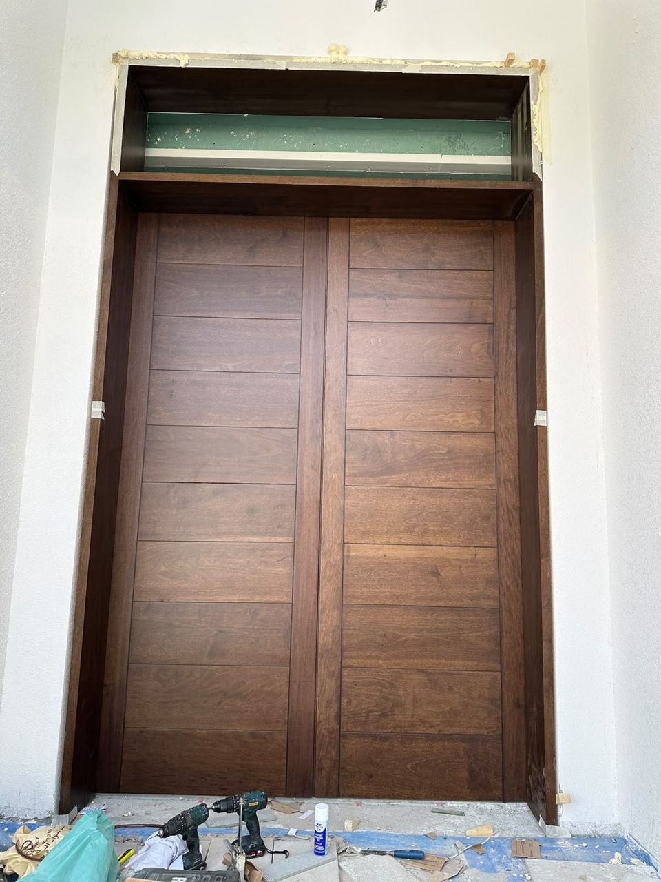 Walnut double main door with glazed fanlight, Springs villa