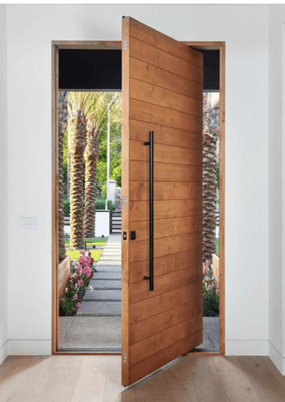 Oak Pivot Entrance Door Open To Garden