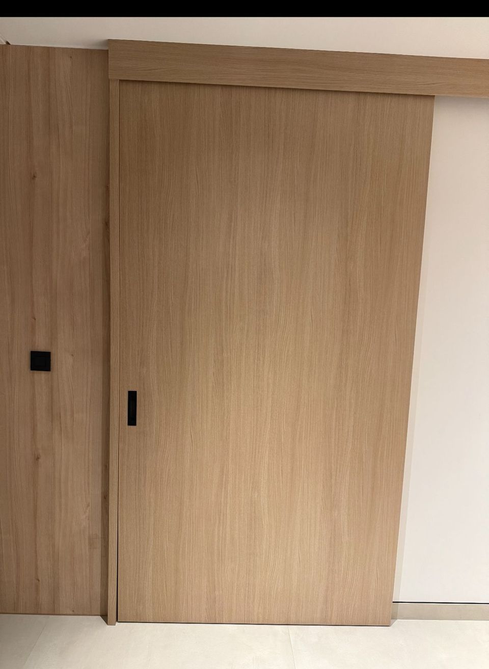 Oak Veneer Sliding Door With Black Flush Pull