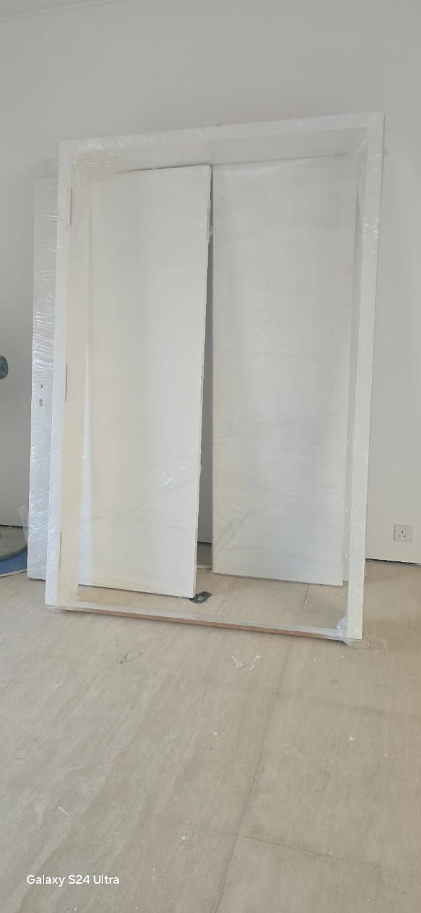 Concealed hidden door frame before plastering