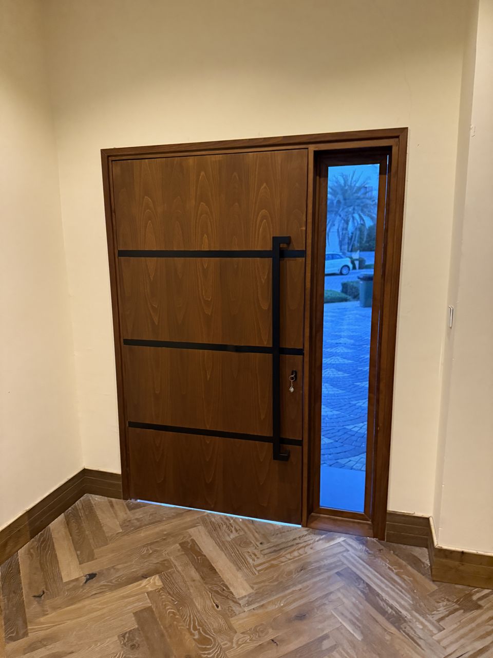 Walnut Entrance Door With Black Bars And Sidelight