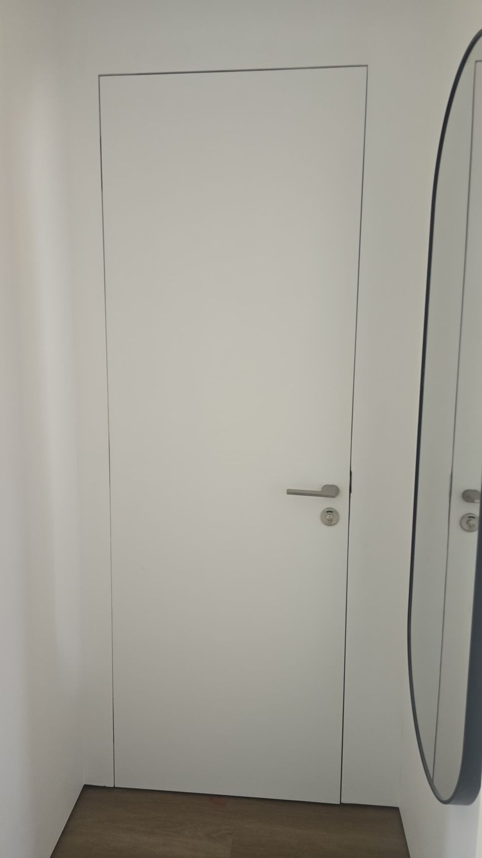 White Flush Concealed Door With Lever